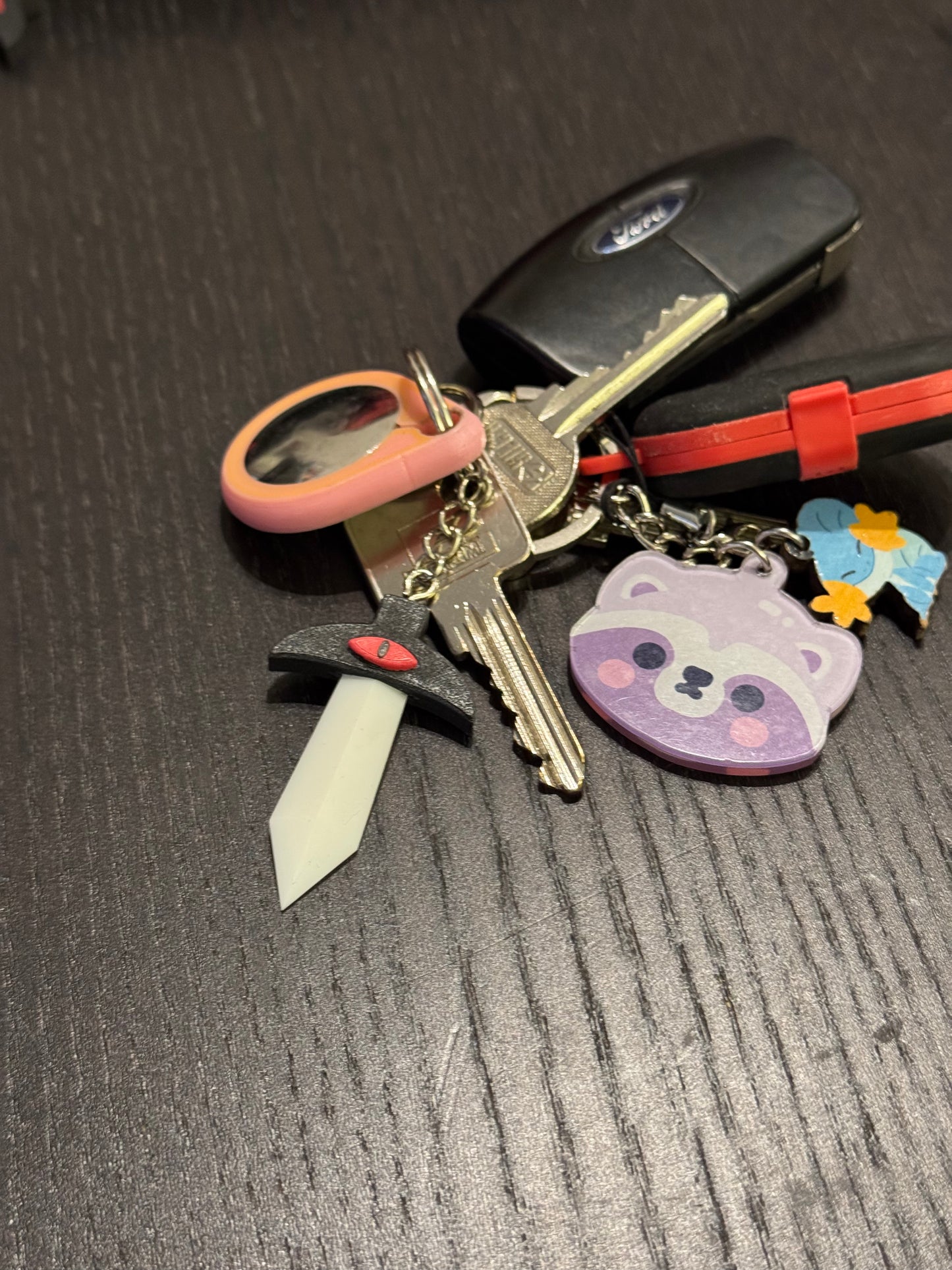 Pre-order: CotL: Crusader's Blade keychain