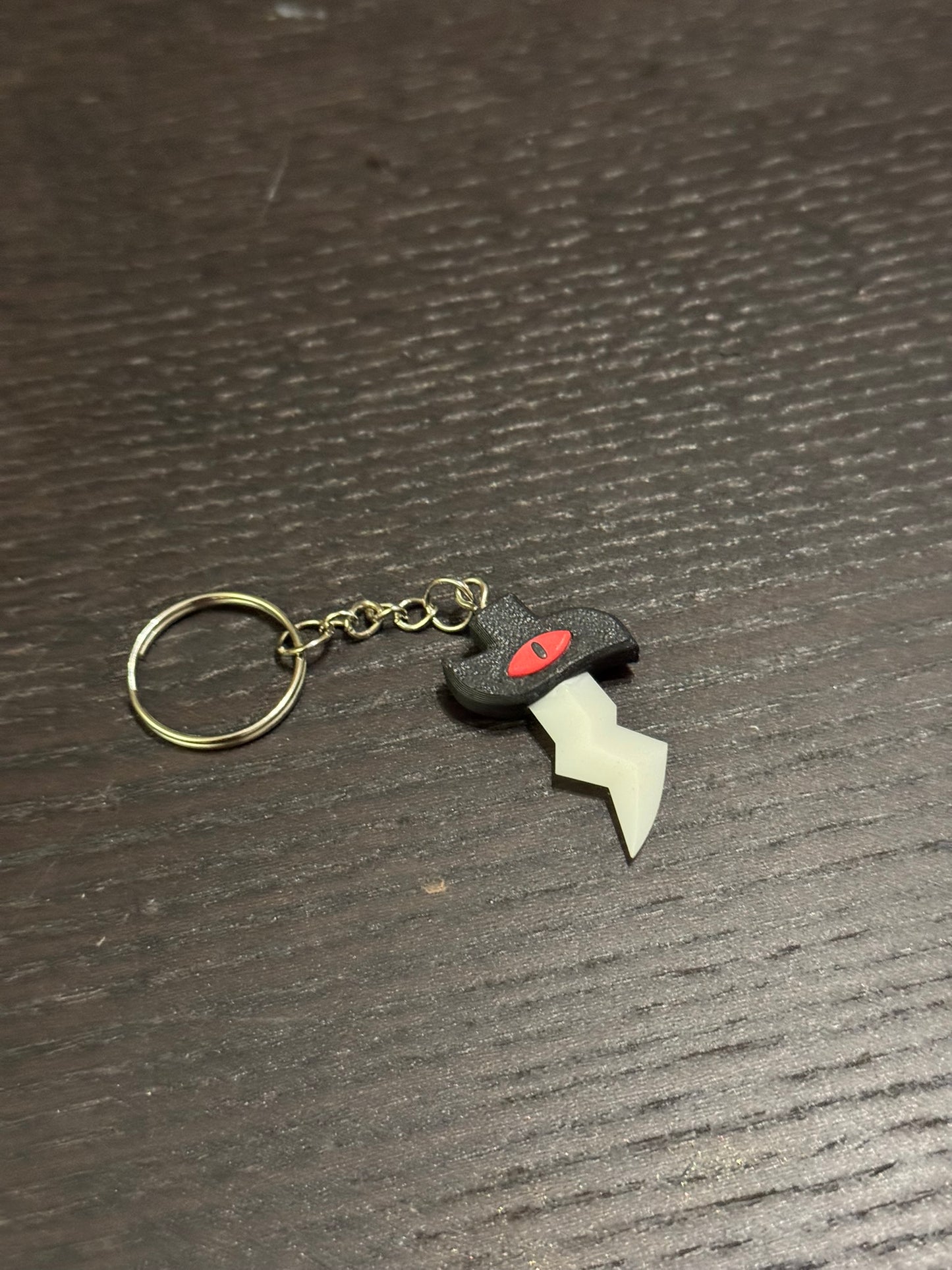 Pre-order: CotL: Traitor's Razor keychain
