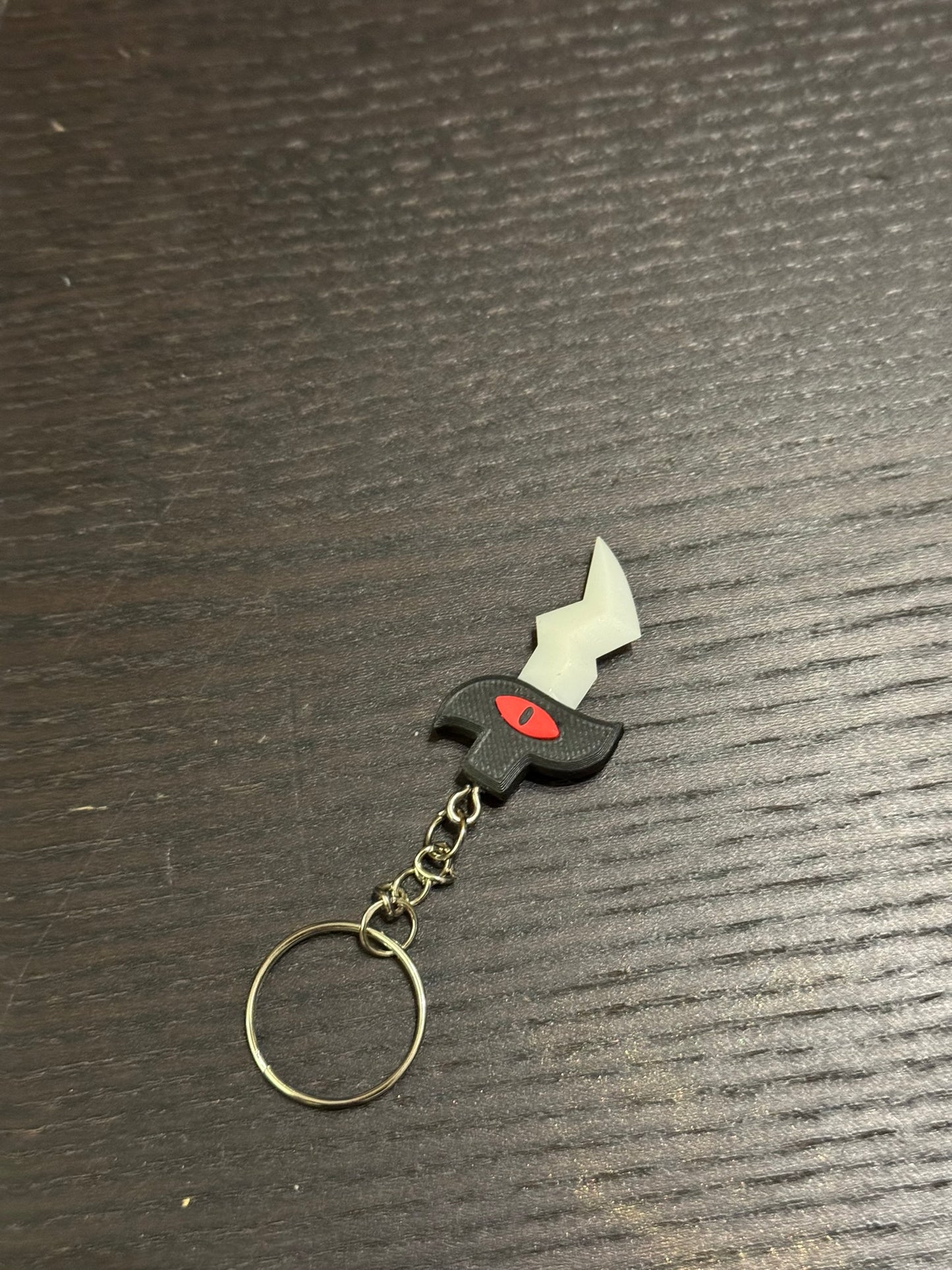 Pre-order: CotL: Traitor's Razor keychain